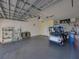 Spacious garage with golf cart and ample storage space at 3604 Blackmoor Ln, Lake Wales, FL 33859