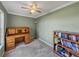 Home office with built-in desk and ample shelving at 3604 Blackmoor Ln, Lake Wales, FL 33859