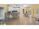 Well-equipped kitchen with white cabinets, granite counters, and breakfast bar at 3604 Blackmoor Ln, Lake Wales, FL 33859