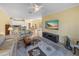 Comfortable living area with leather seating, large TV, and open floor plan at 3604 Blackmoor Ln, Lake Wales, FL 33859