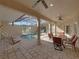 Spacious pool area with covered patio and seating at 3604 Blackmoor Ln, Lake Wales, FL 33859