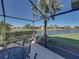Screened patio overlooking a tranquil lake at 3604 Blackmoor Ln, Lake Wales, FL 33859