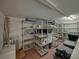 Well-lit storage room with ample shelving for various items at 3604 Blackmoor Ln, Lake Wales, FL 33859