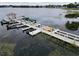 Dock with several boats and a gazebo, on a lake at 4121 Fishermans Lndg, Winter Haven, FL 33884