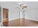 Bright bedroom with wood floors and ceiling fan at 4570 Chambliss Rd, Winter Haven, FL 33884