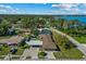 Aerial view of house near lakefront community at 501 Arneson Ave, Auburndale, FL 33823