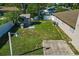 Spacious backyard with a shed and patio at 501 Arneson Ave, Auburndale, FL 33823