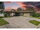 House exterior featuring carport and driveway at 501 Arneson Ave, Auburndale, FL 33823