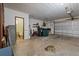 Attached garage with space for cars and additional storage at 501 Arneson Ave, Auburndale, FL 33823