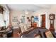 Relaxing living room with hardwood floors, comfortable seating, and barn door at 745 S Rushing Ave, Lakeland, FL 33801