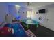 bedroom with a bed, small trampoline, and shelving at 1082 Sunshine Sw Way, Winter Haven, FL 33880