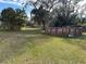 Backyard view with above ground pool and shed at 1322 Shady Cove W Rd, Haines City, FL 33844