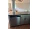 Kitchen with gray cabinets, granite countertops, and dishwasher at 1322 Shady Cove W Rd, Haines City, FL 33844