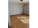 Living room with light walls and wood-look flooring at 1322 Shady Cove W Rd, Haines City, FL 33844