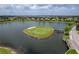 Island green golf course with lake views at 1340 Oakmont Dr, Winter Haven, FL 33884