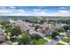 Bird's-eye view of a residential area near a golf course at 1591 Forest Hills Ln, Haines City, FL 33844