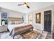 Main bedroom with a king-size bed and ensuite bathroom at 1591 Forest Hills Ln, Haines City, FL 33844