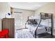 bedroom with a bunk bed and playful decor at 1591 Forest Hills Ln, Haines City, FL 33844