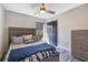 Spacious bedroom with a queen-size bed and ample closet space at 1591 Forest Hills Ln, Haines City, FL 33844