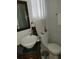 Clean bathroom with updated vanity and toilet at 161 Bonnie Dr, Auburndale, FL 33823