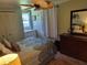 Bedroom with double bed and built-in dresser at 161 Bonnie Dr, Auburndale, FL 33823