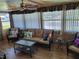 Sunroom with wicker furniture and a view of the outdoors at 161 Bonnie Dr, Auburndale, FL 33823