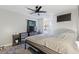 Bright bedroom with a comfortable bed and en-suite bathroom access at 1610 Meadow Ne Ln, Winter Haven, FL 33881