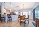 Bright dining area with bay window and wood table at 2060 Hemingway Ave, Haines City, FL 33844