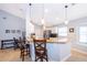 Modern kitchen with granite countertops and white cabinets at 2060 Hemingway Ave, Haines City, FL 33844