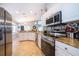 Modern kitchen with granite countertops and stainless steel appliances at 2060 Hemingway Ave, Haines City, FL 33844