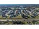Aerial view showcasing the house's location near a golf course at 315 Lauderdale Ct, Kissimmee, FL 34759