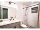 Clean bathroom with a large shower, modern fixtures, and gray vanity at 315 Lauderdale Ct, Kissimmee, FL 34759