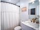 Updated bathroom with modern vanity, quartz countertop, and a stylish shower at 315 Lauderdale Ct, Kissimmee, FL 34759
