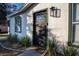 Modern front door with a stylish doormat, welcoming guests into the home at 315 Lauderdale Ct, Kissimmee, FL 34759