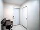 Small laundry room with washer and dryer hookups, desk, and exterior access at 315 Lauderdale Ct, Kissimmee, FL 34759