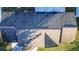 An aerial close-up view of the house's gray asphalt shingle roof at 315 Lauderdale Ct, Kissimmee, FL 34759