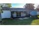 Screened porch with sliding glass doors, providing an outdoor space at 315 Lauderdale Ct, Kissimmee, FL 34759