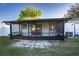 Screened porch with sliding glass doors, offering additional outdoor space at 315 Lauderdale Ct, Kissimmee, FL 34759