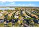 Aerial view of houses and lake at 4092 Carteret Dr, Winter Haven, FL 33884