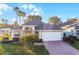 One-story home with attached garage and manicured lawn at 4092 Carteret Dr, Winter Haven, FL 33884