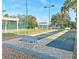 Well maintained shuffleboard courts by the lake at 4092 Carteret Dr, Winter Haven, FL 33884