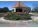 Ornamental guardhouse at the entrance of a gated community at 4329 Whistlewood Cir, Lakeland, FL 33811