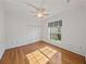 Bedroom with hardwood floors and a window at 5340 Nicklaus Dr, Winter Haven, FL 33884