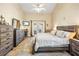 Spacious main bedroom with ensuite bathroom and ample closet space at 5808 Driftwood Dr, Winter Haven, FL 33884