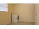 Bright laundry room with washer and dryer included at 616 Pine St, Auburndale, FL 33823