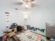 bedroom featuring a rocking chair and crib at 6903 Echo Ln, Lakeland, FL 33813