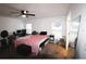 Spacious bedroom with a ceiling fan and large windows at 858 Channing St, Winter Haven, FL 33880