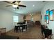 Open living area with dining and seating areas, and carpeting at 858 Channing St, Winter Haven, FL 33880