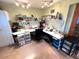 Organized craft or sewing room with plenty of workspace at 128 Stevenson Rd, Winter Haven, FL 33884