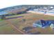 Aerial view of home, lot, and waterfront at 135 Mi Rancho Rd, Davenport, FL 33837